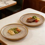 1pc of an 8u002F10 Inch Flat-Bottom Ceramic Plate, Fired in a Kiln And Colored Yellow, Ideal for Serving Dishes Like Desserts, Pasta, Steamed Fish, And Steaks. This Is a High-Quality, Long-Lasting Tableware Suitable for Restaurants