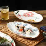 Ceramic Serving Platter Shaped Like a Fish, Measuring 12 Inches, Featuring Floral Designs. It'S a Large, Shallow Dish Suitable for Appetizers, Salads, Desserts, And Snacks, Crafted by Hand And Perfect As a Gift for Tableware Enthusiasts