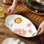 Ceramic Serving Platter Shaped Like a Fish, Measuring 12 Inches, Featuring Floral Designs. It'S a Large, Shallow Dish Suitable for Appetizers, Salads, Desserts, And Snacks, Crafted by Hand And Perfect As a Gift for Tableware Enthusiasts